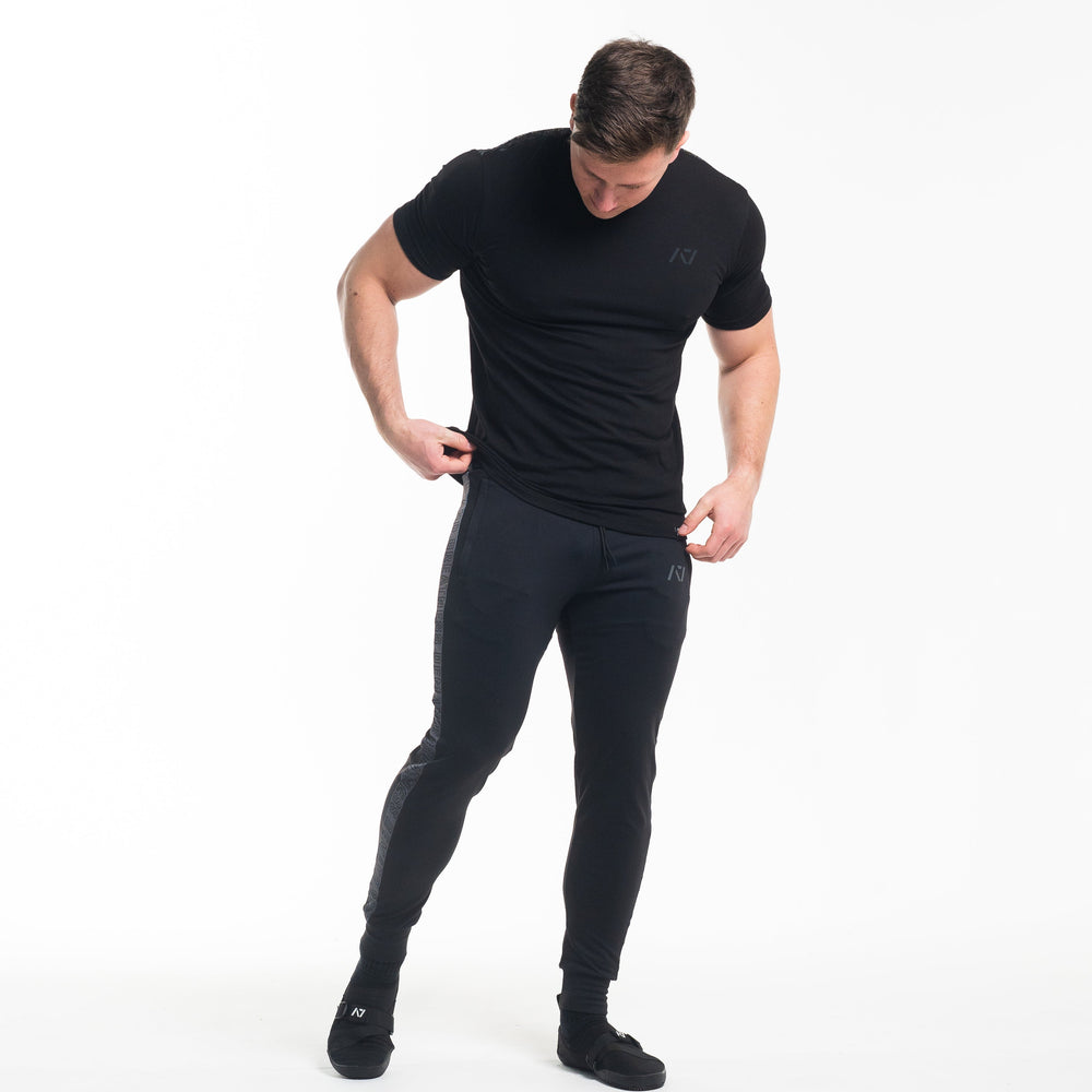 
                      
                        Crest is our classic black on black design. With the Stealth Bar Grip Shirt you can be noticed, yet still, be able to be subtle. The A7 silicone bar grip helps with slippery commercial benches and bars and anchors the barbell to your back. All A7 Powerlifting Equipment shipping to UK, Norway, Switzerland and Iceland.
                      
                    