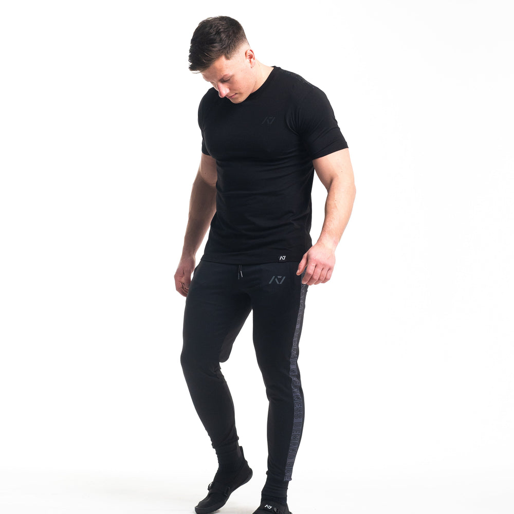 
                      
                        Crest is our classic black on black design. With the Stealth Bar Grip Shirt you can be noticed, yet still, be able to be subtle. The A7 silicone bar grip helps with slippery commercial benches and bars and anchors the barbell to your back. All A7 Powerlifting Equipment shipping to UK, Norway, Switzerland and Iceland.
                      
                    