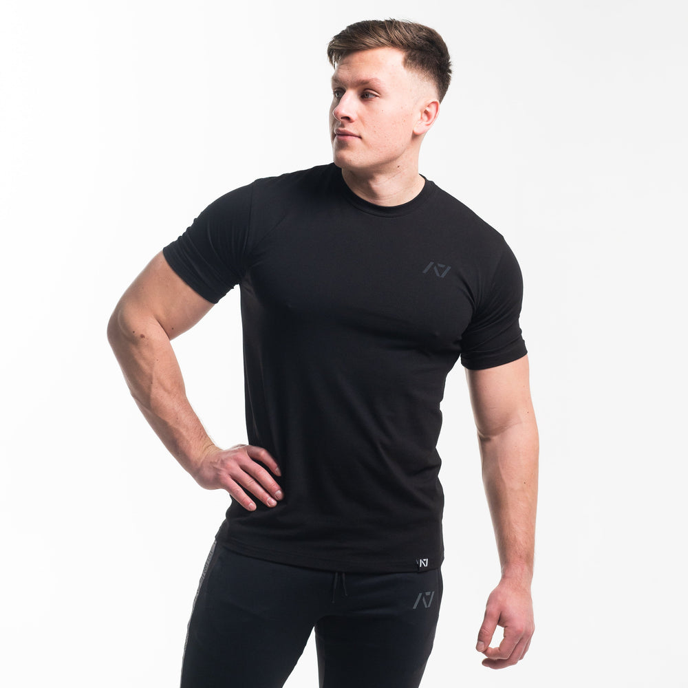 
                      
                        Crest is our classic black on black design. With the Stealth Bar Grip Shirt you can be noticed, yet still, be able to be subtle. The A7 silicone bar grip helps with slippery commercial benches and bars and anchors the barbell to your back. All A7 Powerlifting Equipment shipping to UK, Norway, Switzerland and Iceland.
                      
                    