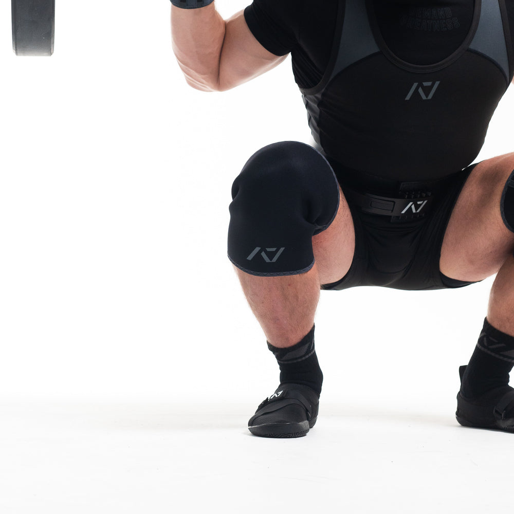 
                      
                        A7 IPF Approved Hourglass Knee Sleeves feature an hourglass-shaped centre taper fit to help provide knee compression while maintaining proper tightness around the calf and quad, offered in three stiffnesses (Flexi, Stiff and Rigor Mortis). Shop the full A7 Powerlifting IPF Approved Equipment collection. The IPF Approved Kit includes Powerlifting Singlet, A7 Meet Shirt, A7 Zebra Wrist Wraps and A7 Deadlift Socks. All A7 Powerlifting Equipment shipping to UK, Norway, Switzerland and Iceland. 
                      
                    